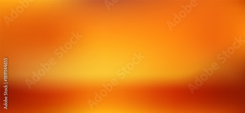 Warm sunset gradient background with orange and red hues blending into golden tones, perfect for elegant autumn designs, posters, and seasonal creative projects with soft light transitions.