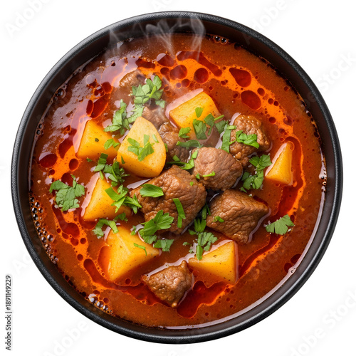 фотографія Hearty beef stew with potatoes and herbs in rich red broth