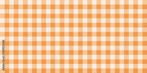 Seamless orange and white gingham plaid pattern. Classic checkered plaid background for picnic, kitchen, and textile design.