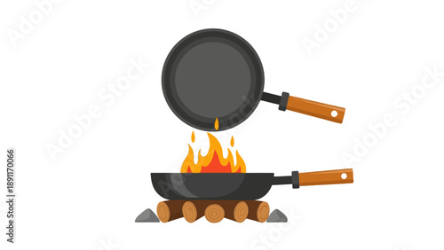 Two frying pans one over a campfire with flames