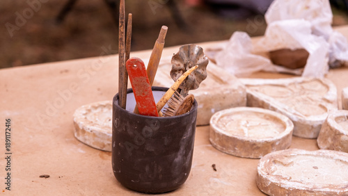 Artisan pottery tools and clay molds display