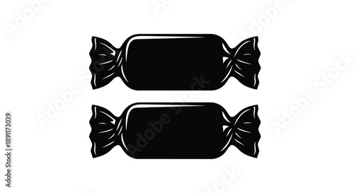 Two wrapped candies presented on a white background a dark silhouette