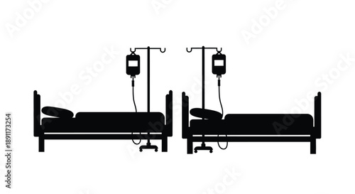 Hospital beds with iv drips a stark black silhouette