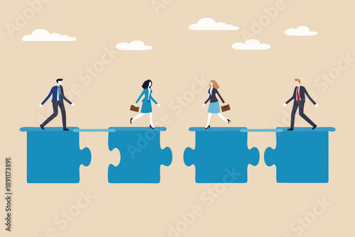 Diverse business team walking on puzzle pieces toward collaboration and success