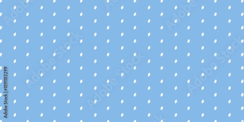 Seamless pattern of tiny white daisy flowers on a light blue background. Minimalist floral ditsy print for summer fashion, wallpaper, and delicate textile design.