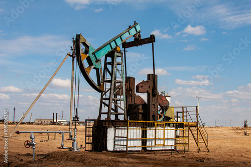 An oil pump pumps crude oil in the steppes of Kazakhstan near the city of Aktau.