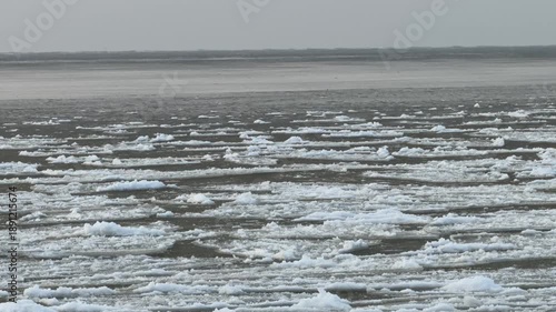 baltic sea beach winter cold  waves jurmala latvia