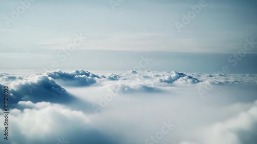 Wallpaper Mural Vast cloudscape creating a peaceful backdrop for concepts of freedom, travel, and tranquility, with soft light illuminating the atmospheric layers and an endless blue sky above Torontodigital.ca