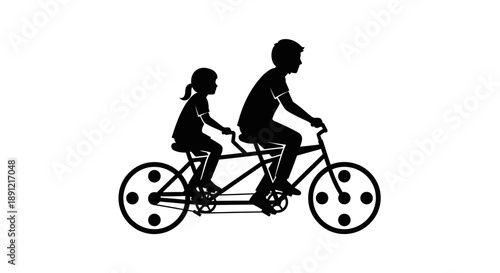 Silhouette of father and daughter riding a tandem bicycle together.