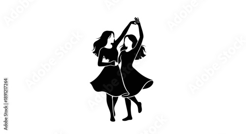 Silhouette of two young women dancing together in a joyful and carefree manner.