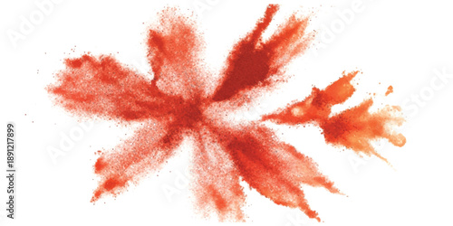 A vibrant red powder explosion creating a dynamic, starburst-like shape against a clean white background