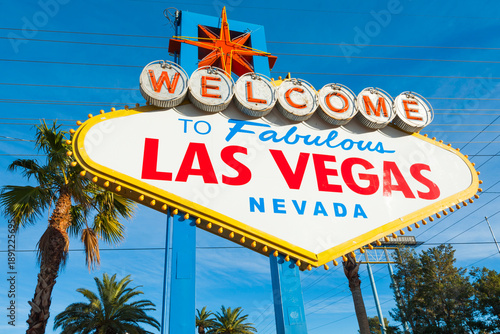 Las Vegas, Nevada, United States of America. 01-15-2026 Welcome to Fabulous Las Vegas Neon Sign With Sunset Beautiful Cloudy Sky With Airplane Leaving