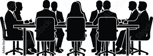 Business people sitting around a conference or boardroom table for a meeting. Group discussion or a presentation scenario. Seated on chairs, with some appearing to take notes. 