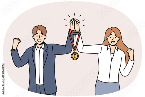 Team business man and woman together received winners medal for excellent work on assigned tasks. Union or team of office employees leads to victory and trophy in professional skills competition