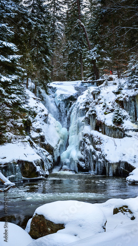 Wodospad Szklarki - waterfall in the winter time near Szklarska Poręba, Giant Mountains, Karkonosze, Lower Silesia, Poland