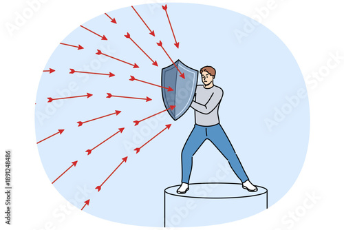 Brave man defends himself from problems using shield to deflect flying arrows from enemies. Brave guy demonstrates self-control when faced with business threats or troubles in personal life.