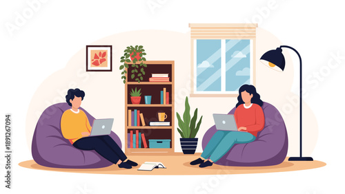 Cozy living room interior with two people sitting in beanbag chairs and focused on working with their laptop computers.