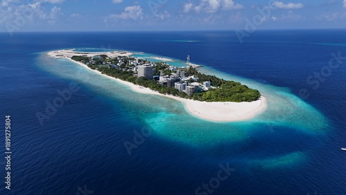 Aerial drone view of Ukulhas Maldives tropical island with white sand beach and coral reef