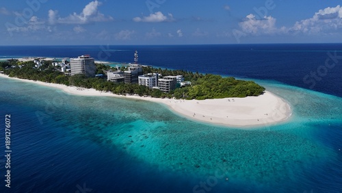 Aerial drone view of Ukulhas Maldives tropical island with white sand beach and coral reef