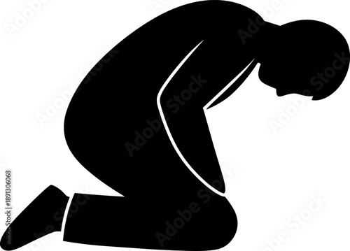 Silhouette of a Man Kneeling in Prayer or Submission