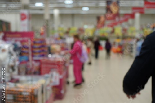 Wallpaper Mural Blurred background. People buy groceries at the supermarket. Torontodigital.ca