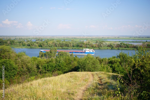 Wallpaper Mural A barge is sailing on the Don River. Natural landscape with green trees. Torontodigital.ca