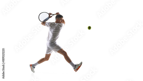 Tennis player mid air backhand swing isolated on white background. Concept of dynamic stroke execution, jump timing drills, tennis movement training, athletic performance visuals.