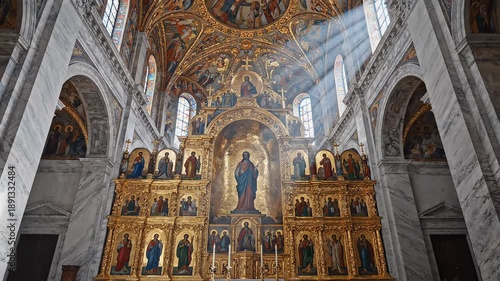 Interior of ornate church with golden altar