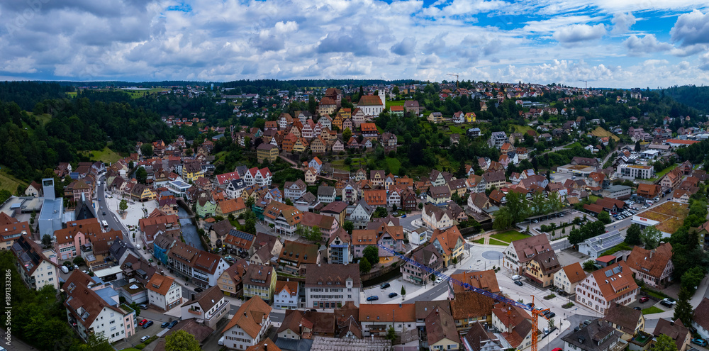 Obraz premium Aerial panoramic view of the city Altensteig in Germany on a sunny spring afternoon.