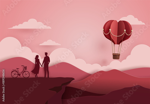Paper art style vector illustration of a romantic couple holding hands on a cliff with a bicycle and red heart balloon, Valentine's day concept.