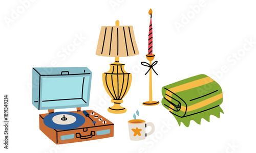 Flat color illustration of a cozy set with a vinyl player, lamp, candle, and mug. Elements of a festive home interior for winter greeting cards, holiday posters, or graphic design projects