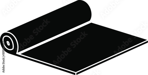 Black yoga mat rolled up and partially unrolled on a white background
