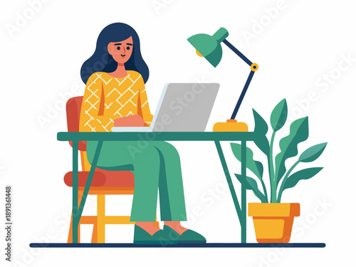 A young woman works on a laptop at a desk with a plant