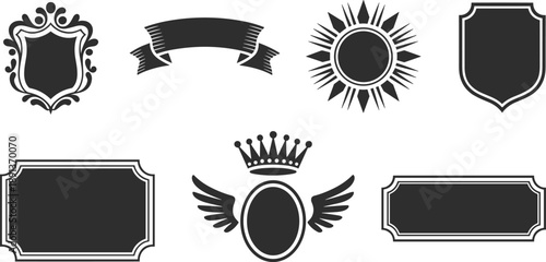 Set of black heraldic vector icons featuring shields, ribbon banners, sunbursts, crowns, and winged emblems for vintage logo design and coat of arms.