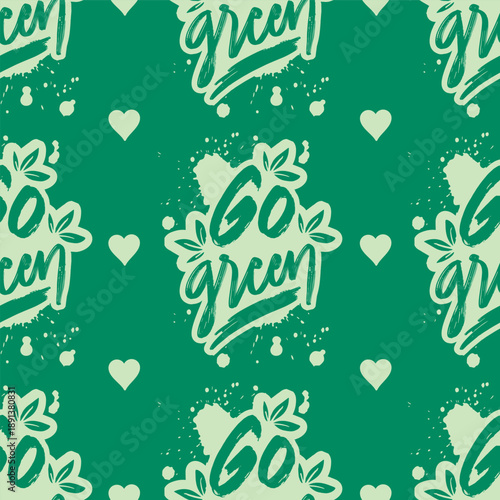 Seamless pattern with lettering go green and hearts on green background. Vector illustration.
