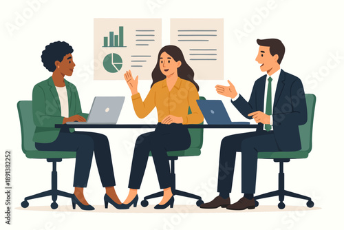 A diverse group of business professionals engaged in a meeting with laptops and graphs