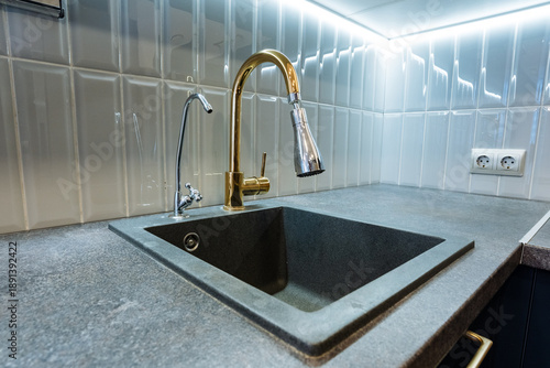 Elegant Faucet Presentation, Premium Faucet With Swivel Feature, Highquality Pullout Faucet With Ergonomic Design, Showroomready Gold Faucet With Ergonomic Handle And Swivel Mechanism