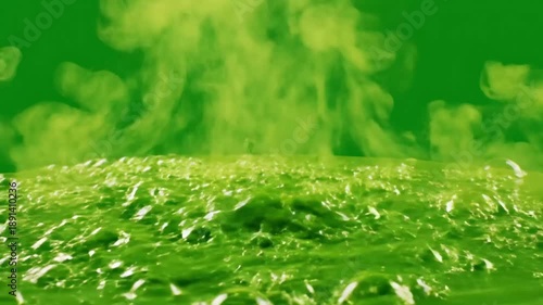 Green Liquid Bubbles and Explosions Abstract Motion Background.