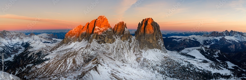 Fototapeta premium Panorama of the Dolomites mountains in Sellaronda during autumn sunrise