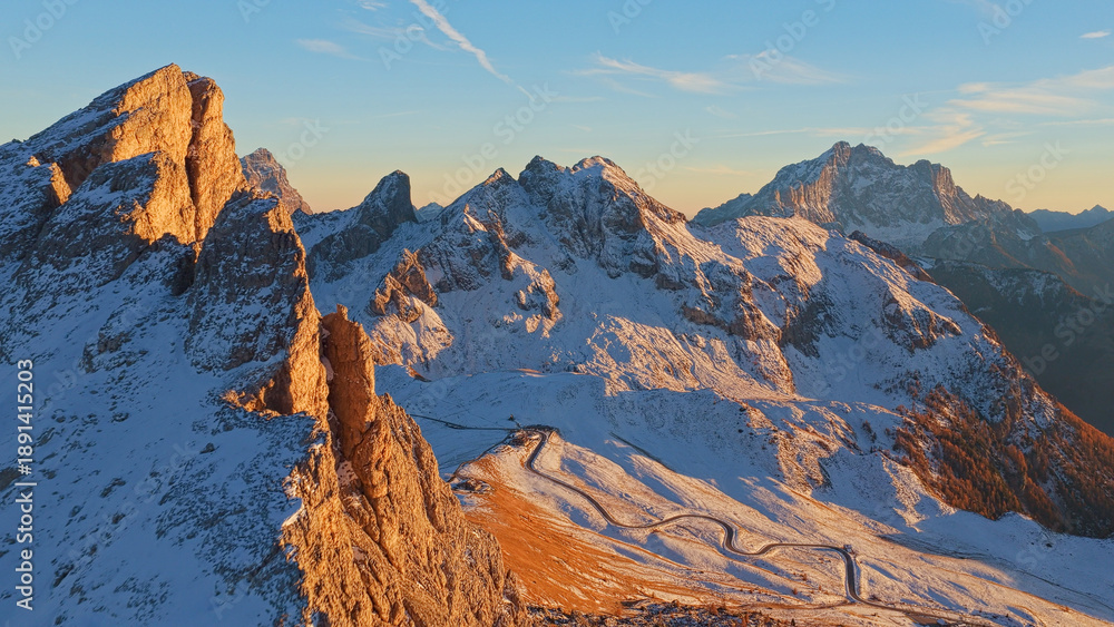 Fototapeta premium Panorama of Passo Giau in the Dolomites mountains during autumn sunrise