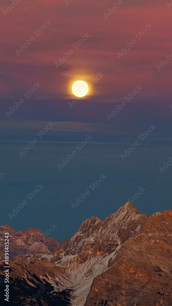Obraz premium Panorama of the Dolomites mountains with full moon