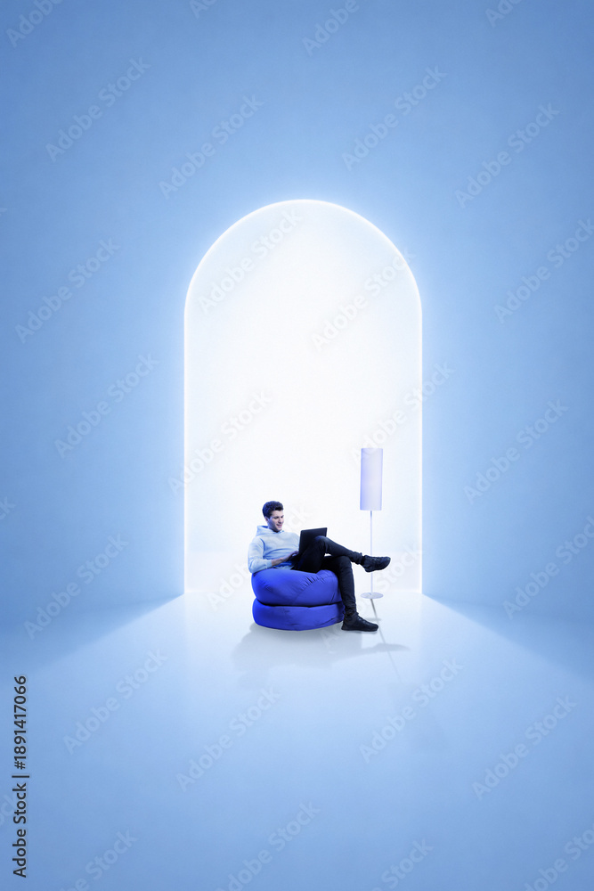 Obraz premium Clean mixed media with man working on laptop in blue interior with glowing arch. Concept of remote job, digital lifestyle, personal productivity, modern home office and calm concentration.