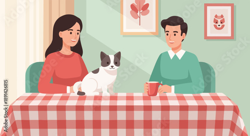 Couple and pet cat sit at a table covered with a red and white checkered tablecloth