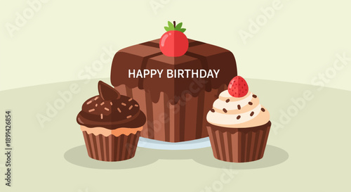 Chocolate birthday cake and cupcakes with strawberry decorations