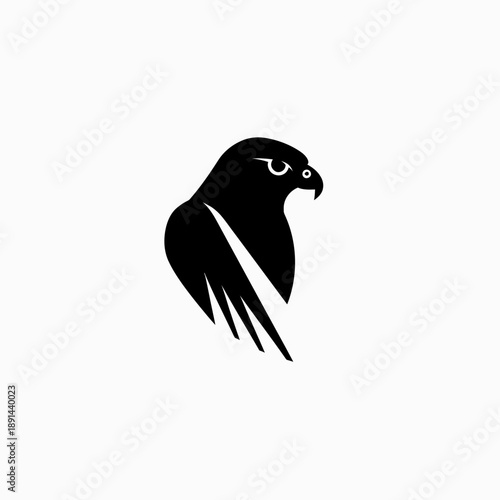 Powerful falcon or hawk head silhouette. Majestic predatory bird profile vector illustration, emblem or iconic design element.