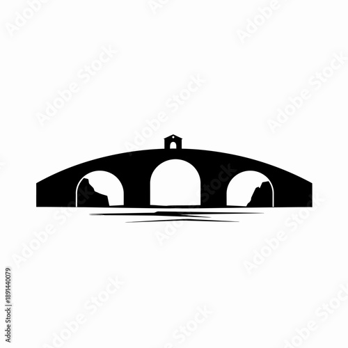 Ancient stone arched bridge silhouette icon with a small chapel or structure on top, over water. Historic architecture vector art.