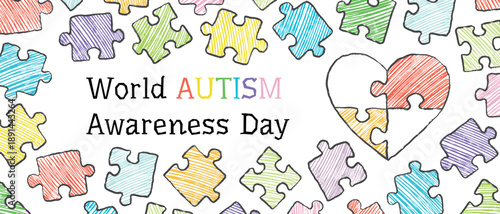 Hand drawn world autism awareness day banner with jigsaw puzzles pieces, heart symbol. Vector sketch illustration in vintage doodle crayon charcoal style