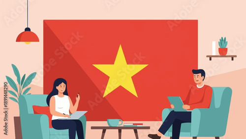 Couple working with laptop in front of Vietnam flag