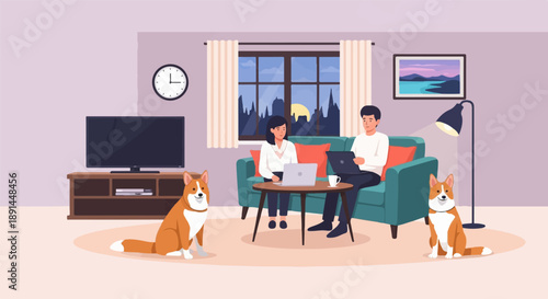 Couple working on laptops with dogs in cozy living room at night