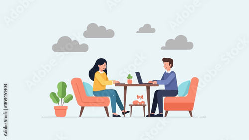 Couple working on laptops at a cafe with a cat